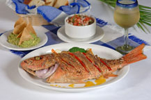 fried red snapper at baja cantina restaurant and dockside bar in cabo san lucas, mexico