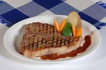 grilled t-bone steak at baja cantina restaurant and dockside bar in cabo san lucas, mexico