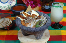 beef molcajete - stone dish - served at la casa country restaurant in cabo san lucas