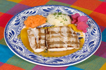 grilled fish with mango salsa at la casa del pozo restaurant