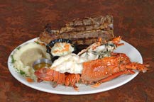 steak and lobster combo served at the original park restaurant - cabo san lucas, mexico