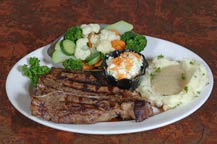 porterhouse steak served at the original park restaurant - cabo san lucas, mexico